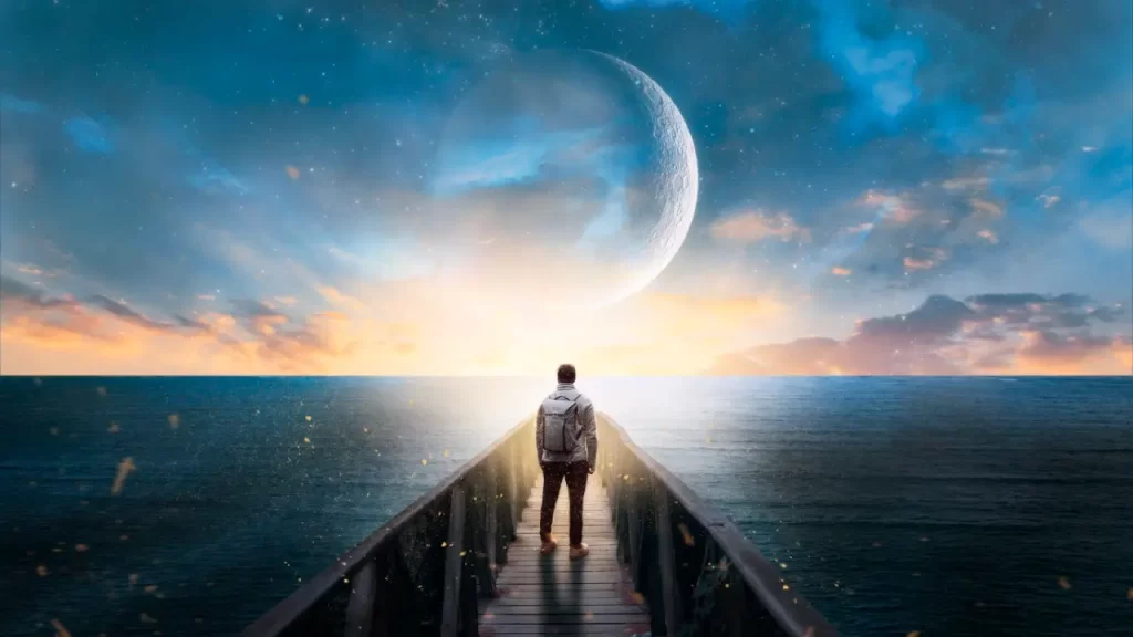 Projeção Astral com Segurança: Técnicas homem na ponte andando em direção a lua